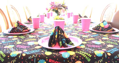 Happy Birthday Tablecloth Black Background. Bright Colors.