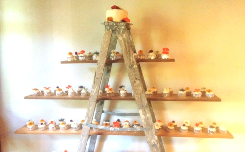 Causal Summer Cupcakes Displayed on a Ladder.