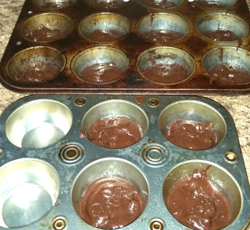 Ghirardelli brownie mix in mini muffin tin.