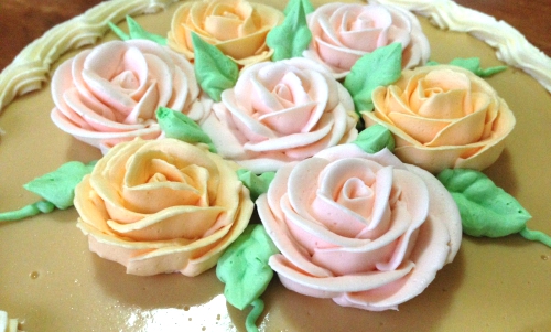 Swiss Meringue Buttercream with High Ratio Shortening.